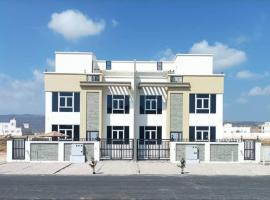 Orient Apartments - Taqah、Sumhuranのホテル