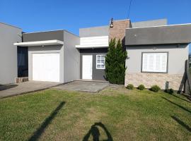 Casa Müller - Veraneio Imbé, Hotel in Imbé