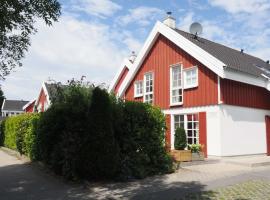 Ferienhaus Strandläufer, hotel en Krummhörn