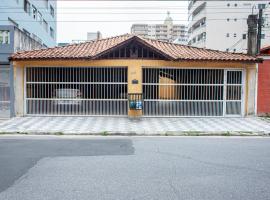 Casa aconchegante c churrasqueira a 400m da praia، فندق في برايا جراندي