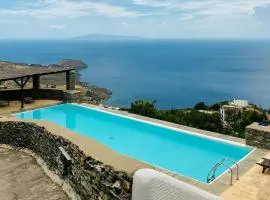 Andros -Stone house with shared pool & seaview