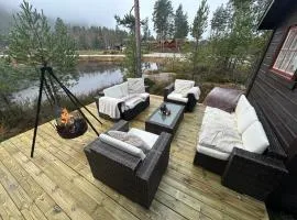 Cozy cabin with great view and immediate proximity to the ski resort and swimming area