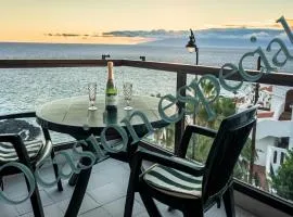 Apartamentos Lago Oceanfront with Los Gigantes and La Gomera Views