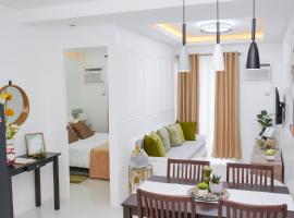 Cozy Crib Suite Condo with Balcony Pool & Gym, acomoda&ccedil;&atilde;o em condom&iacute;nio em Puerto Princesa