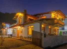 Alaya Stays Rose 3BHK Cottage Fenced by Hills with Fireplace
