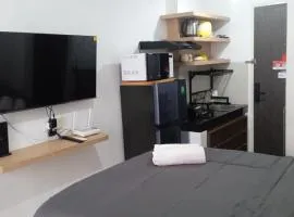 FREE WIFI, NETFLIX, SMART TV, MINERAL WATER, AMENITIES - Studio with Foldable Wall Bed at Serpong Garden Apt