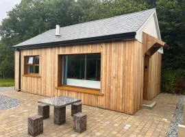 Cosy Studio Cabin set in nature with stove