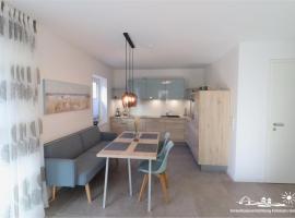 15 Ferienwohnung Inselschatz mit Wallbox, hotel in Landkirchen