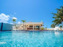 Qavi - Casa Palm Paradise #ParaisoDoBrasil，位于托鲁斯的酒店
