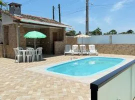 Casa com Piscina em Pontal do Sul