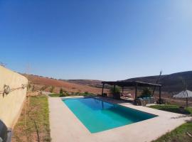 Rez-de-jardin piscine Benslimane, отель в городе Ziaïda