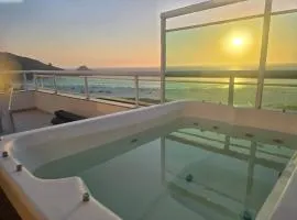 Cobertura com vista espetacular para o mar jacuzzi e churrasqueira
