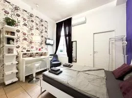 Cozy Central Studio AC- Purple Room