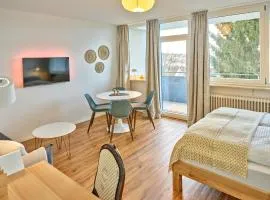 RESIDERY - Dein modernes, zentrales Apartment mit Arbeitsplatz, Balkon und Stadtblick