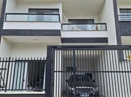 sobrado próximo a praia