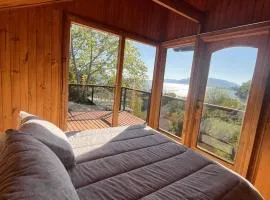 Escape to Our Cosy Wooden Cabin on Lake Calafquén
