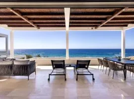 Stylish Oceanfront Condo with Panoramic Views