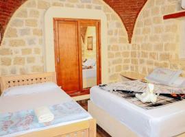 Tebtunis Hotel, hotel com piscina em Qaryat at Ta&lsquo;mīr as Siyāḩīyah