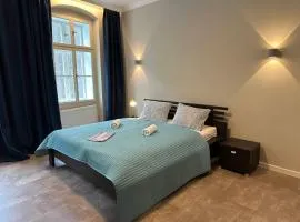 Grand Pupp Apartment with Jacuzzi and Netflix by Rentez