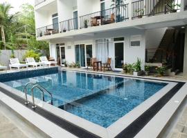 Di Sicuro Tourist Inn, hotel in Hikkaduwa