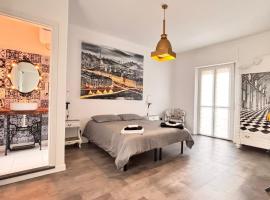 Estilenuevo Fashion Rooms, hotel in Druento
