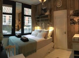 Guesthouseamsterdam – hotel w pobliżu miejsca Browar i muzeum Heineken Experience w Amsterdamie