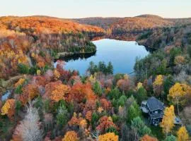 Lakefront Otis Home with Stunning Views and Boats!