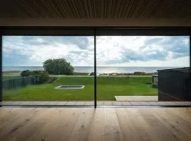 Ocean view in first row. Architectural pearl