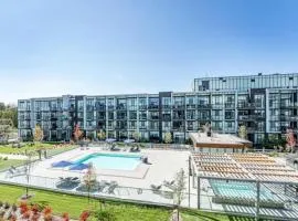 Comfy 1BR Condo w Balcony BBQ Pool and Parking