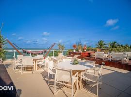 In Mare Bali Resort Cobertura com Jacuzzi by Qavi, hotel in Granja Beira Mar