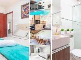 Refúgio Tropical Casa de Praia com Piscina Climatizada e 4 Suítes e garagem 3 carros, 800 mtrs da praia internet 700 mbps, condomínio privado com pista de skate , quadra de futevôlei , campos e quadras de futebol!