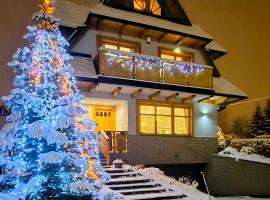 Domek za Strugiem - pokoje i apartamenty