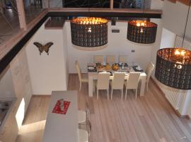 Meraviglioso Loft con vista sulle Dolomiti, maison de vacances à Colle Santa Lucia