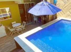 Casa próxima a praia com piscina!