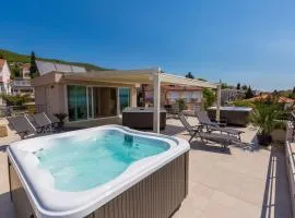 Faszienierendes Apartment nur 100 Meter zum Strand mit Jacuzzi, Sauna, Meerblick