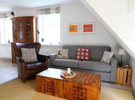 Neuerbautes Haus im Friesenstil. Moderne 2-Zimmer-Appartements mit Balkon für bis zu 4 Personen