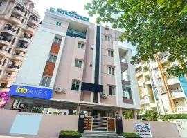 FabHotel The Sunrise Inn - Nr Gayatri Vidya Parishad College of Engineering