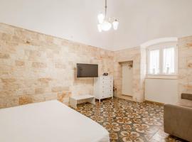 Antiche Mura Apartments"Bianco di Puglia" cucina 1 camera da letto più divano letto, hotel a Turi