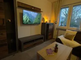 Moderne Wohnung mit Waldflair und Kaffeegenuss