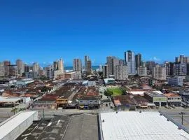 1011 VISTA PRAIA MAR - 500 m da praia da Tupi - comércio ao lado, posto de conveniência 24H, WI FI e ESTACIONAMENTO gratuito, Mercado e serviço Lavanderia Lava e Seca (pago) dentro do condomínio