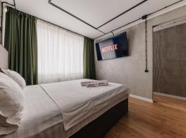 Фирменные апартамменты от Vita Haus Sunny, cheap hotel in Petropavlovsk