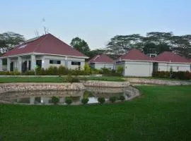 Top Cottages Gardens and Restaurant Kapeeka