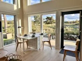 Minihus med utsikt nära hav, natur och Göteborg