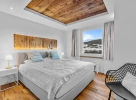 Perfekte Aussicht mit Poolbereich in Skiregion
