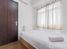 Modern Look and Comfortable 2BR Serpong Greenview Apartment By Travellio