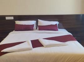 Ridhis, hotel v destinaci Virajpet