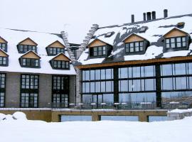 HG策尔勒公寓酒店，位于塞尔勒的酒店