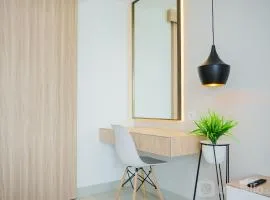 Comfy and Minimalist Studio at Embarcadero Bintaro Apartment By Travelio