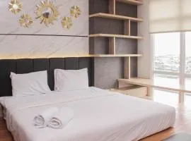 Minimalist and Cozy Studio at Vasanta Innopark Apartment By Travelio