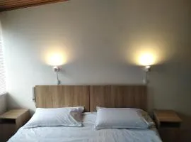 Cuarto Cama King Smart TV en apartamento atico Tunja